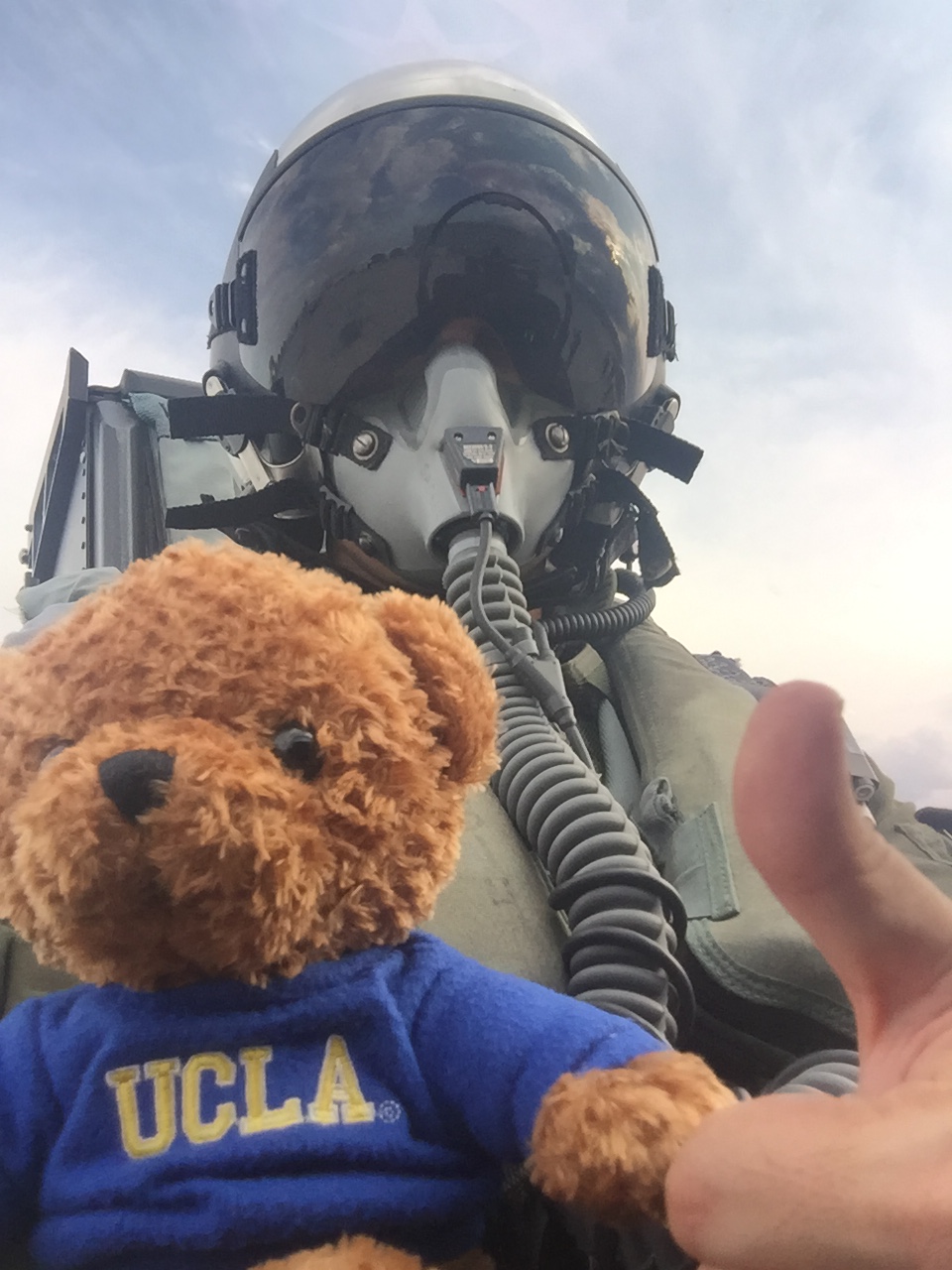 EMBA pilot Stephen Austad and Bear in cockpit